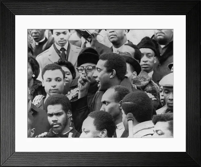 Framed Print : Profile of Stokely Carmichael speaking and gesturing in midst of crowd demonstrating near the Capitol in Washington, DC. January 10, 1967 Framed Print : Profile of Stokely Carmichael speaking and gesturing in midst of crowd demonstrating near the Capitol in Washington, DC. January 10, 1967