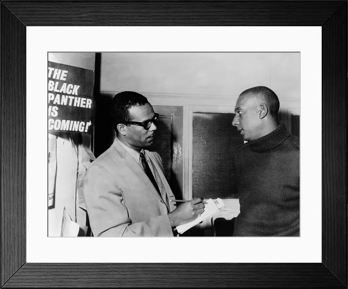 Framed Print : Stanley S. Scott interviewing Stokely Carmichael at Student Non-Violent Coordinating Committee (SNCC) headquarters in New York in 1966