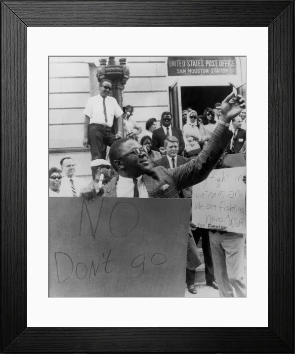 Framed Print : Supporters of Muhammad Ali, formerly Cassius Clay, cheer on a man burning draft card in Houston, Texas