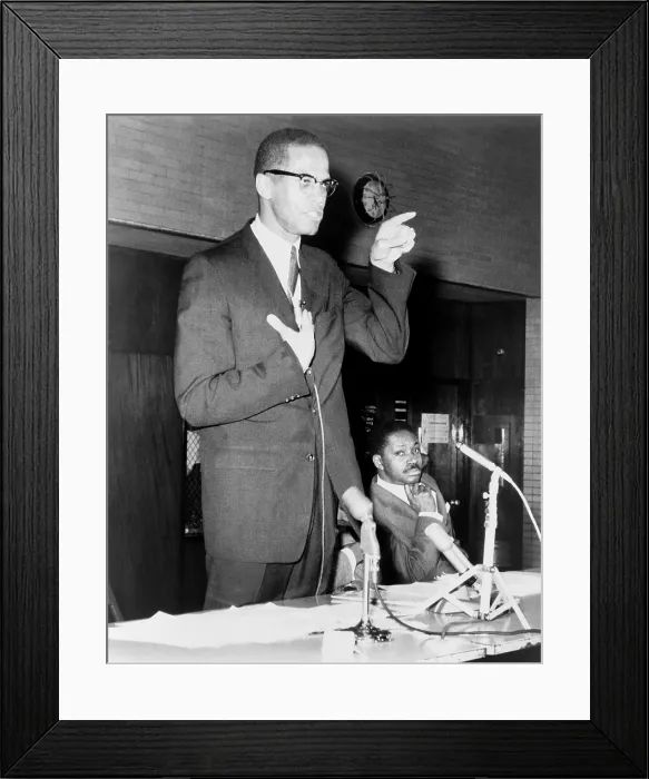Framed Print : Malcolm X speaks in support of the Harlem school boycott at a rally