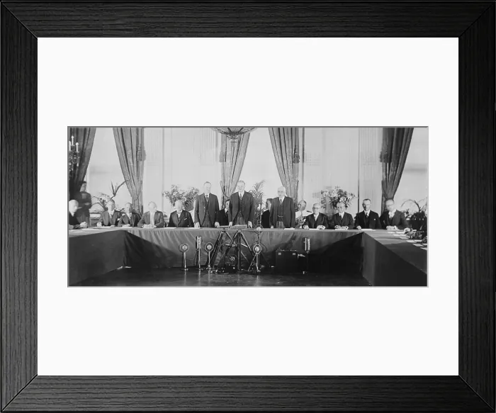 Framed Print : President Calvin Coolidge (1872-33) Herbert Hoover 1874-1964), standing, with diplomats who have ratified the Treaty for Renunciation of War (Kellogg-Briand Pact)