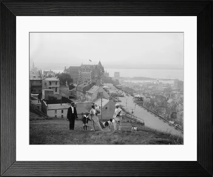 Framed Print : A family walks on the heights of Quebec City. Le Chteau Frontenac in the background is still the premier Quebec City landmark. 1910's