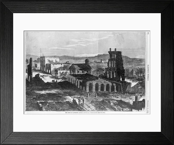 Framed Print : The Civil War, The ruins of buildings in Lawrence, Kansas, following attack by William Quantrill and his Confederate raiders. Woodcut ca. 1863
