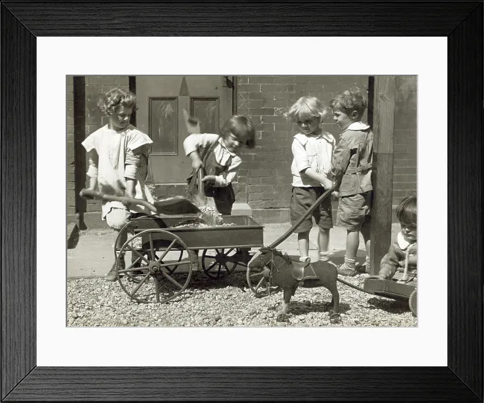 Framed Print : Chrildren playing with rocks, a wagon and a toy pony. Photograph by Jessie Tarbox Beals, 1915 Framed Print : Chrildren playing with rocks, a wagon and a toy pony. Photograph by Jessie Tarbox Beals, 1915