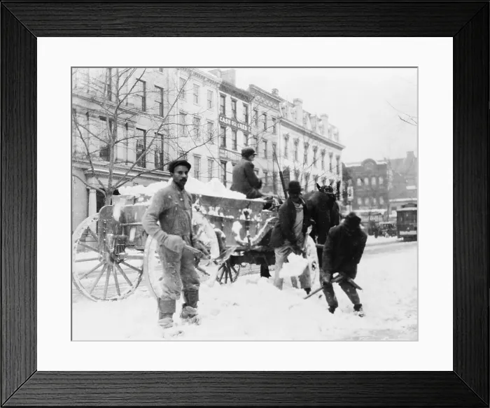 Framed Print : African American men loading snow onto wagon, after a 1915 snow storm. In Washington, D.C. Under-employed African Americans provided emergency manual labor for public works