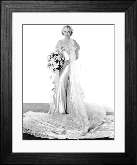 Framed Print : ELINOR NORTON, Claire Trevor, in a white satin wedding gown by Rene Hubert, 1934. TM & Copyright 20th Century Fox Film Corp. / courtesy Everett Collection