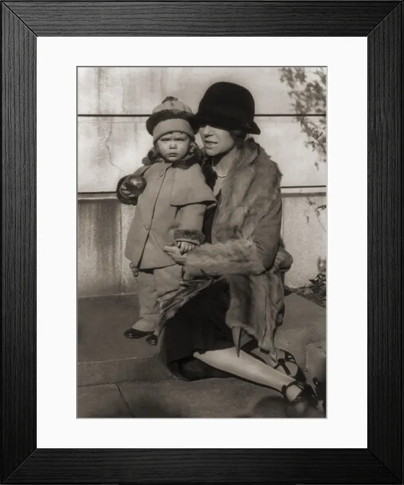 Framed Print : Alice Roosevelt Longworth (1884-1980), with her two year old daughter, Paulina. Senator William Borah, was Paulina's biological father. 1927