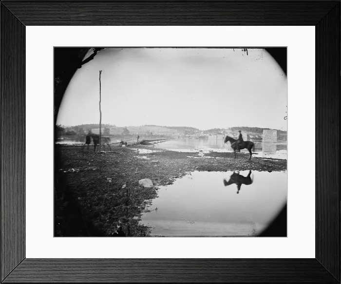 Framed Print : The Civil War. The Battle of Antietam. Pontoon bridge and ruins of the stone bridge across the Potomac River, Berlin, Md. Photograph by Alexander Gardener. 1862