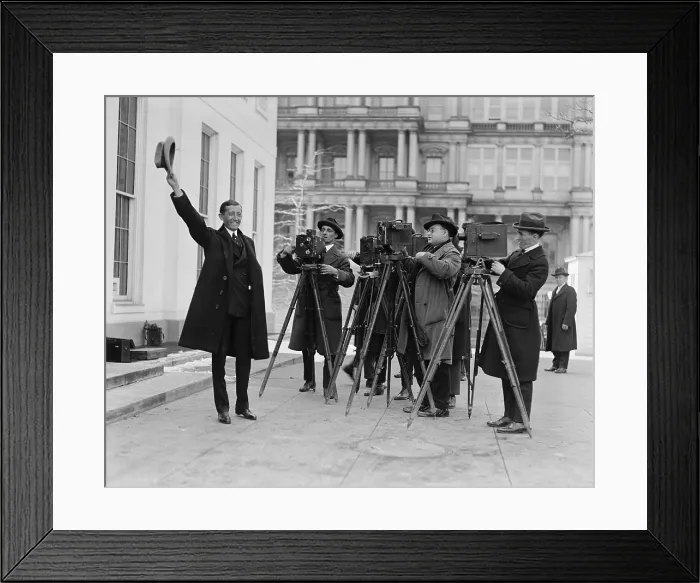 Framed Print : Will Hays (1879-1954), outgoing Postmaster General waving his hat for newsmen, President of the Motion Picture Producers and Distributors of America until 1955. March 3, 1922