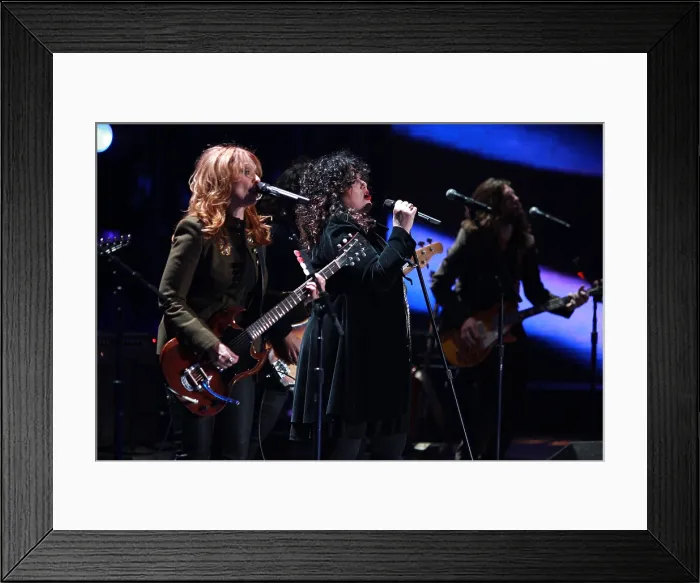 Framed Print : Ann and Nancy Wilson of Heart perform for US military the 2010 Divas Salute the Troops concert at Marine Corps Air Station Miramar near San Diego California. Dec. 3