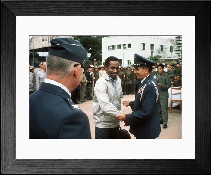 Framed Print : Air Force Major Norman A. McDaniel is greeted by a US delegation at a Hanoi Airport upon his release as prisoner of war in North Vietnam Framed Print : Air Force Major Norman A. McDaniel is greeted by a US delegation at a Hanoi Airport upon his release as prisoner of war in North Vietnam