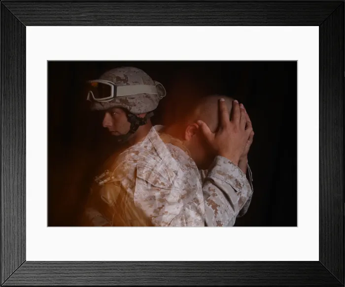 Framed Print : Dramatization of a US Marine affected by post traumatic stress disorder which is experienced by many soldiers long after the danger of combat is over. (BSLOC_2011_12_359)
