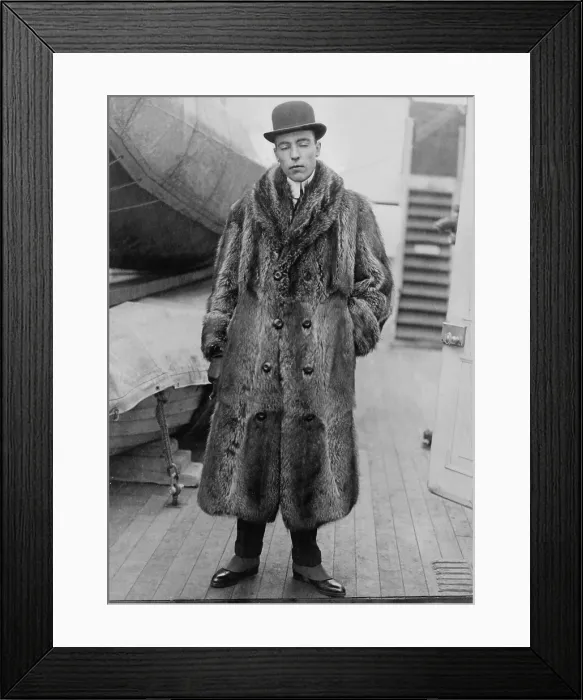 Framed Print : Vincent Astor (1891-1959), on deck of ship wearing fur coat