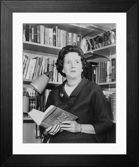 Framed Print : Rachel Carson (1907-1964), biologist and writer, holding her ground breaking book, THE SILENT SPRING, 1963