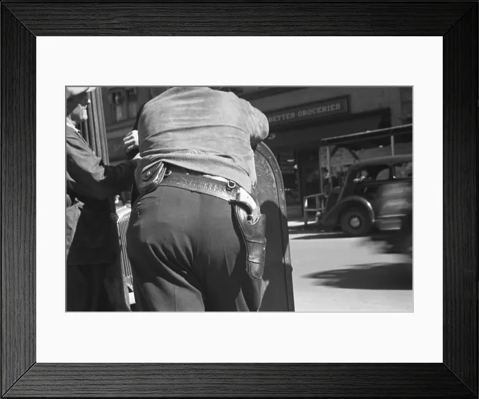 Framed Print : Back view of a deputy sheriff with a gun on his hip during the September 1935 strike in Morgantown, West Virginia Framed Print : Back view of a deputy sheriff with a gun on his hip during the September 1935 strike in Morgantown, West Virginia