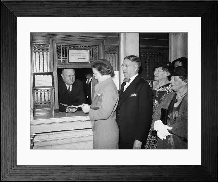 Framed Print : Postmaster James Farley at Post Office service window. 1934. FDR appointed Farley Postmaster General, a post traditionally given to campaign managers or influential supporters