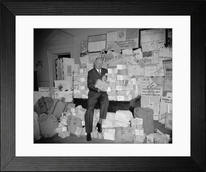 Framed Print : James Farley inspects letters sent during airmail week celebration. June 15, 1938