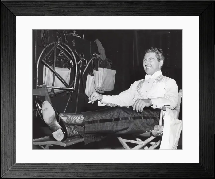 Framed Print : SINCERELY YOURS, Liberace, relaxing on set, 1955, . ph: Pat Clark  /  TV Guide  /  courtesy Everett Collection