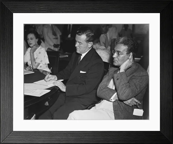 Framed Print : Thomas Corcoran (center) is grilled at a House rules investigation. July 9, 1935