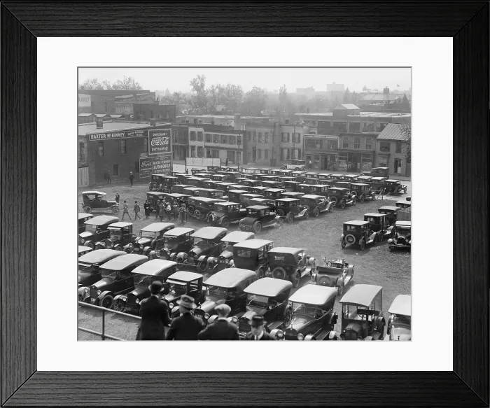 Framed Print : Parking lots for cars become part to the American landscape in the 1920s. Image shows autos parked at ball park near Washington, D.C. in 1923