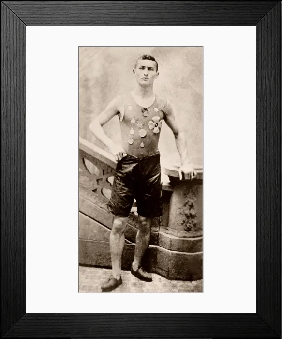 Framed Print : Harry Houdini (1874-1926), in 1890, when his name was still Ehrich Weiss. He is wearing medals, he won as a member of the Pastime Athletic Club track team in New York Framed Print : Harry Houdini (1874-1926), in 1890, when his name was still Ehrich Weiss. He is wearing medals, he won as a member of the Pastime Athletic Club track team in New York
