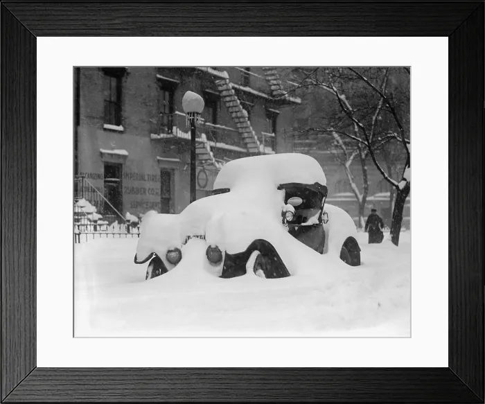 Framed Print : 1920's model car is covered with snow after a January 1922 blizzard in Washington, D.C