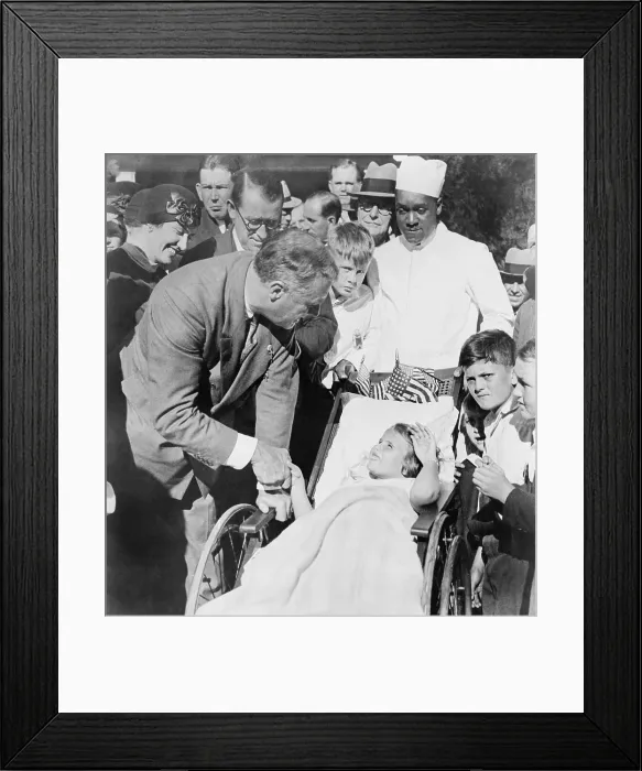 Framed Print : Franklin D. Roosevelt, governor of New York, campaigning for President in 1932 at greets a young girl in wheelchair at Warm Springs, Georgia