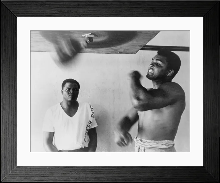 Framed Print : Muhammad Ali, works out on light bag in Miami, Florida. 1965 Framed Print : Muhammad Ali, works out on light bag in Miami, Florida. 1965