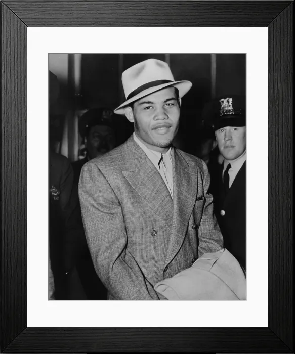 Framed Print : Joe Louis (1914-1981), became the new World Heavyweight Boxing Champion after defeating James J. Braddock in Chicago on June 22, 1937 Framed Print : Joe Louis (1914-1981), became the new World Heavyweight Boxing Champion after defeating James J. Braddock in Chicago on June 22, 1937