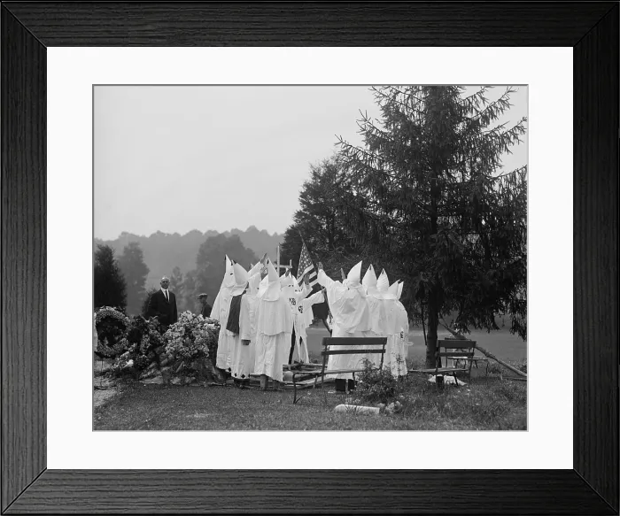 Framed Print : 1923 Ku Klux Klan funeral ritual. The KKK offered members regalia, costumes, and rituals with its racism