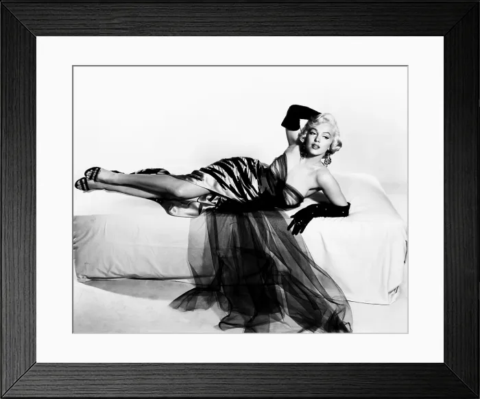 Framed Print : THE SEVEN YEAR ITCH, Marilyn Monroe, (in a a gown by Travilla), 1955, TM and Copyright 20th Century Fox Film Corp. All rights reserved. Courtesy: Everett Collection Framed Print : THE SEVEN YEAR ITCH, Marilyn Monroe, (in a a gown by Travilla), 1955, TM and Copyright 20th Century Fox Film Corp. All rights reserved. Courtesy: Everett Collection