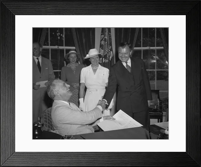 Framed Print : President Franklin Roosevelt congratulates newly sworn in Justice Robert Jackson. July 11, 1941. L-R: Henry Hopkins (cropped); FDR; Mary Jackson, daughter of Mr. Jackson; Mrs