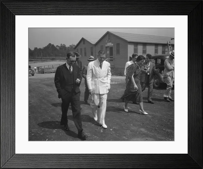 Framed Print : Rex Tugwell and aides visit the Greenbelt planned community in Maryland. July 1936. Greenbelt was designed to provide low-income housing and employment for 885 families Framed Print : Rex Tugwell and aides visit the Greenbelt planned community in Maryland. July 1936. Greenbelt was designed to provide low-income housing and employment for 885 families
