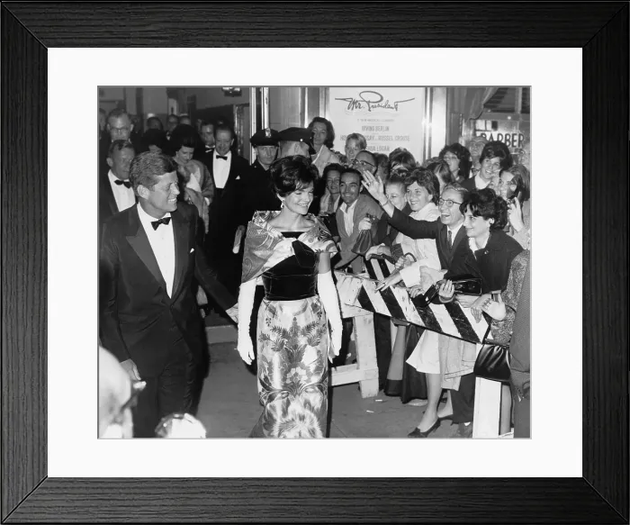 Framed Print : President and Mrs. John F. Kennedy are greeted crowd outside National Theatre after a performance of Irving Berlin's musical, MR. PRESIDENT. September 1962