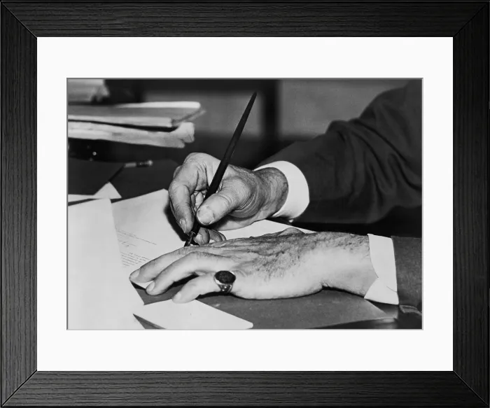 Framed Print : Hands of Franklin D. Roosevelt signing a document in the First 100 Days of the New Deal. 1934