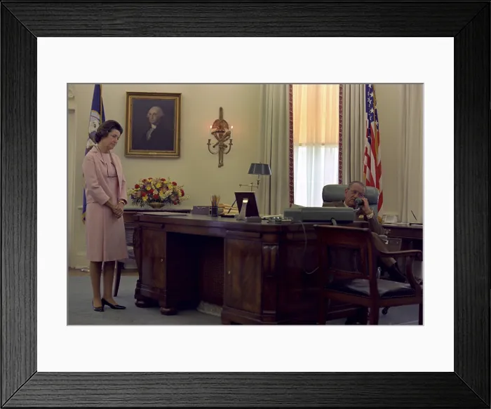 Framed Print : President Lyndon Johnson telephones the Kennedys after Robert Kennedy's assassination. The saddened First Lady looks on. June 6, 1968