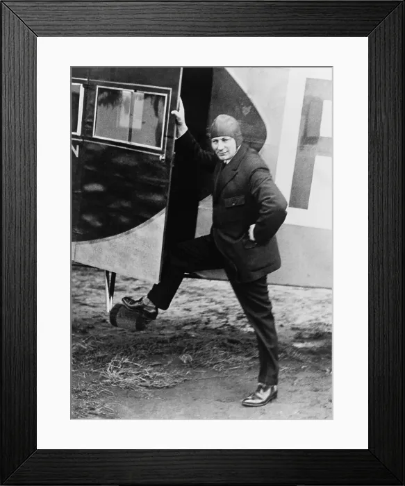 Framed Print : Anthony Fokker (1890-1939), aviator and a Dutch-American aircraft manufacturer stepping into one of his planes. 1935