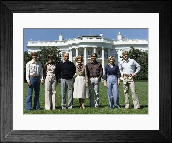 Framed Print : Ford family portrait on the White House South Lawn. L to R: Mike, Mike's wife Gayle, President Ford, Mrs. Ford, Jack, Susan, and Steve. September 6, 1976