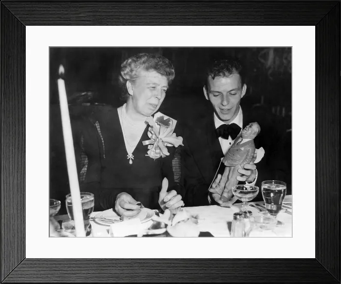 Framed Print : Eleanor Roosevelt and Frank Sinatra in Los Angeles. June 15, 1947. Sinatra is holding a figurine depicting the late President Franklin Roosevelt. (BSLOC_2013_6_61) Framed Print : Eleanor Roosevelt and Frank Sinatra in Los Angeles. June 15, 1947. Sinatra is holding a figurine depicting the late President Franklin Roosevelt. (BSLOC_2013_6_61)