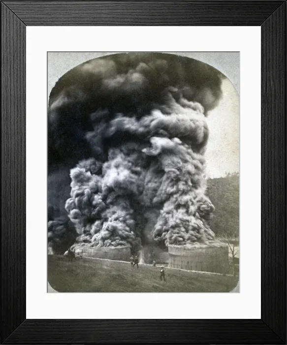 Framed Print : The Pennsylvania oil region. Black smoke spewing from the tops of two oil storage tanks shortly after they burst into flame at the Imperial Refinery near Oil City, Pennsylvania Framed Print : The Pennsylvania oil region. Black smoke spewing from the tops of two oil storage tanks shortly after they burst into flame at the Imperial Refinery near Oil City, Pennsylvania