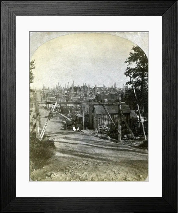 Framed Print : The Pennsylvania oil region. West side of Triumph Hill, near Tidioute, Pennsylvania with buildings, storage tanks, and derricks. 1875