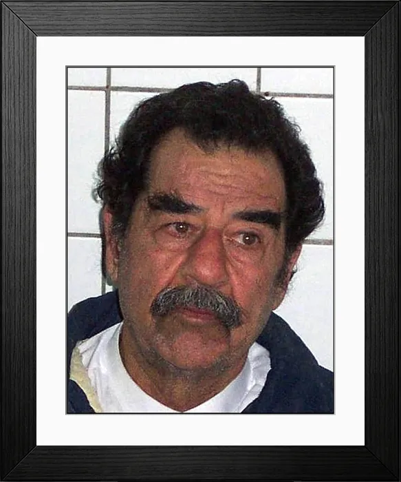 Framed Print : Saddam Hussein shortly after his capture by US forces in Tikrit Iraq. Dec. 14 2003. (BSLOC_2011_12_140)