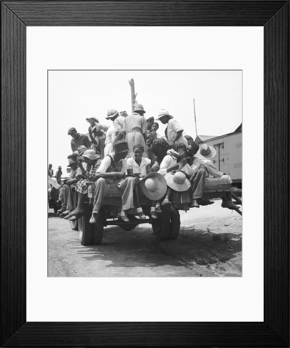 Framed Print : African American workers on the back of a truck earned 75 cents a day. July 1936. They will picked peaches in Muscella, Georgia. Photograph by Dorothea Lange. (BSLOC_2013_6_85)