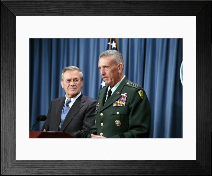 Framed Print : General Tommy Franks Commander of U.S. Central Command in Afghanistan alongside Secretary of Defense Donald Rumsfeld speaks during a press briefing on Aug