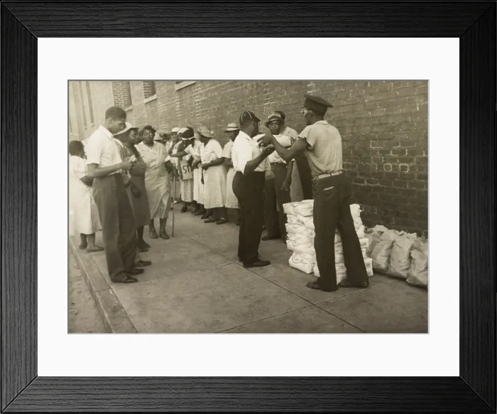 Framed Print : Food handed out to striking African American tobacco workers. Richmond, VA. 1938. In the 1930s and 1940s civil rights unionism supported tobacco workers. (BSLOC_2013_6_90) Framed Print : Food handed out to striking African American tobacco workers. Richmond, VA. 1938. In the 1930s and 1940s civil rights unionism supported tobacco workers. (BSLOC_2013_6_90)