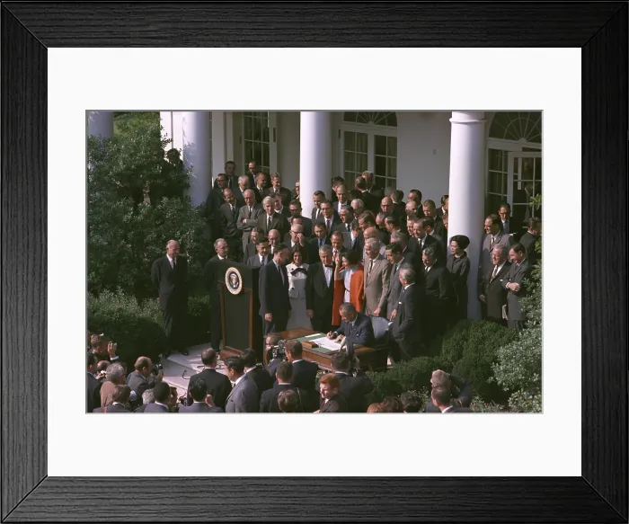 Framed Print : LBJ's Great Society programs. President Lyndon Johnson signing the Arts and Humanities Bill in the White House Rose Garden Framed Print : LBJ's Great Society programs. President Lyndon Johnson signing the Arts and Humanities Bill in the White House Rose Garden