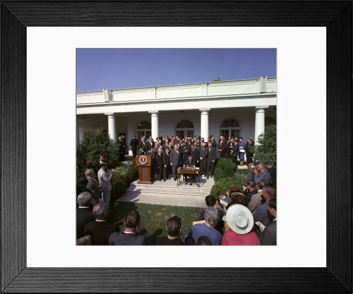 Framed Print : LBJ's War on Poverty. President Lyndon Johnson signing the Poverty Bill (aka Economic Opportunity Act). Aug. 20, 1964 Framed Print : LBJ's War on Poverty. President Lyndon Johnson signing the Poverty Bill (aka Economic Opportunity Act). Aug. 20, 1964