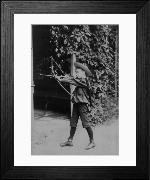 Framed Print : Franklin D. Roosevelt at age 10 with a bow and arrow in Karlsruhe, Germany. 1892. (BSLOC_2013_6_8) Framed Print : Franklin D. Roosevelt at age 10 with a bow and arrow in Karlsruhe, Germany. 1892. (BSLOC_2013_6_8)