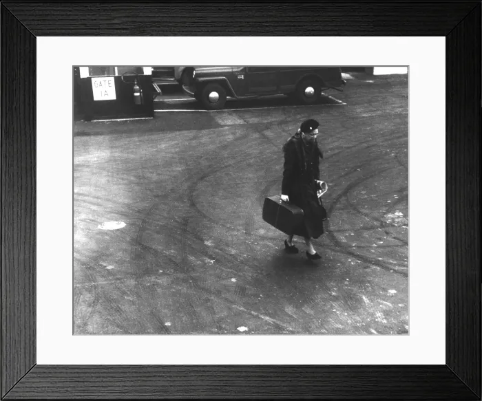 Framed Print : Eleanor Roosevelt carrying her suitcase at LaGuardia Airport, NYC. 1960. Photo by Lawrence W. Jordan. (BSLOC_2013_6_76) Framed Print : Eleanor Roosevelt carrying her suitcase at LaGuardia Airport, NYC. 1960. Photo by Lawrence W. Jordan. (BSLOC_2013_6_76)