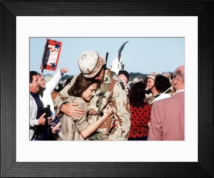 Framed Print : Family and friends greet members of the 82nd Airborne Division upon their return from Operation Desert Storm. Apr. 2 1991. (BSLOC_2011_12_15)
